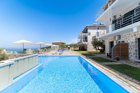 Property building, Living room, Swimming pool
