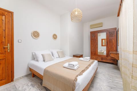 Bed, Photo of the whole room, Bedroom, towels, wardrobe, air conditioner