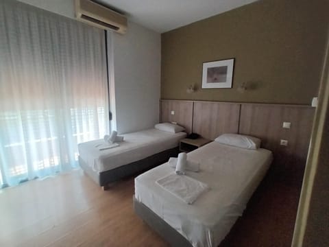 Bed, Photo of the whole room, Bedroom, towels, air conditioner