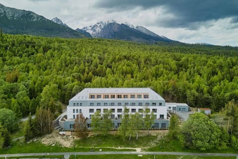 Property building, Nearby landmark, Spring, Day, Natural landscape, Mountain view