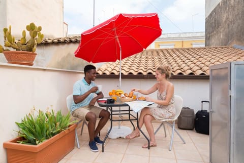 Patio, Day, People, View (from property/room), Balcony/Terrace, Dining area, Guests