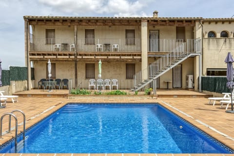 Property building, Living room, Swimming pool