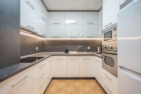 Kitchen or kitchenette, stove