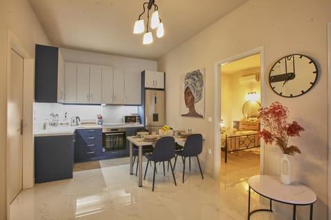 Kitchen or kitchenette, Living room, Seating area, Dining area