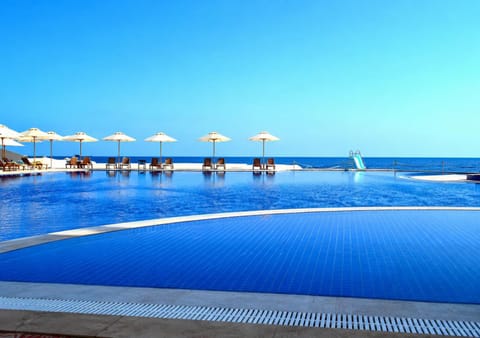 Day, Natural landscape, Beach, Pool view, Sea view, Swimming pool, sunbed