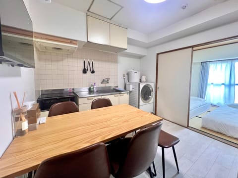Kitchen or kitchenette, Dining area, washing machine, dryer