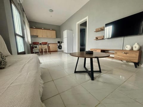 TV and multimedia, Kitchen or kitchenette, Living room, Seating area, Dining area