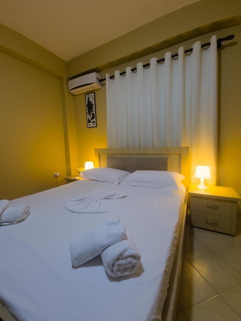 Bed, Photo of the whole room, Bedroom, towels, air conditioner