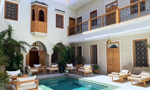 Property building, Patio, Balcony/Terrace, Pool view, Swimming pool, sunbed