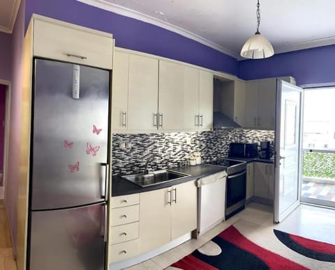 Kitchen or kitchenette, dishwasher, oven, stove