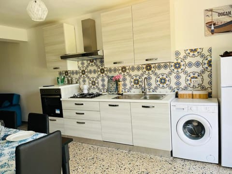 Kitchen or kitchenette, oven, stove
