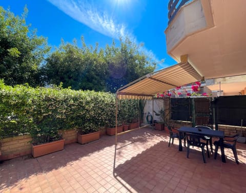 Property building, Patio, Spring, Day, Garden, View (from property/room), Dining area, Garden view