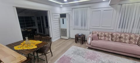 Living room, Seating area, Dining area, air conditioner