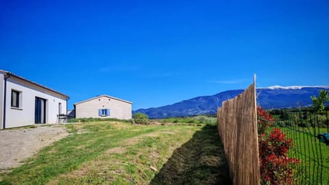 Property building, Spring, Day, Natural landscape, Mountain view