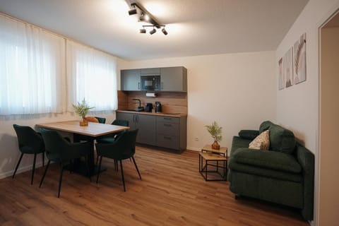 Kitchen or kitchenette, Living room, Seating area, Dining area