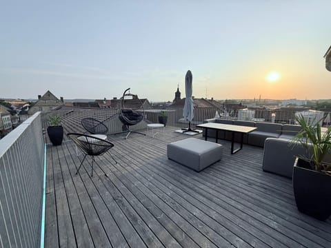View (from property/room), Balcony/Terrace, Seating area, Sunset