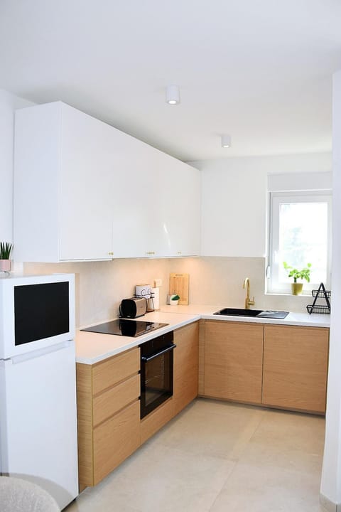 Kitchen or kitchenette, stove, toaster