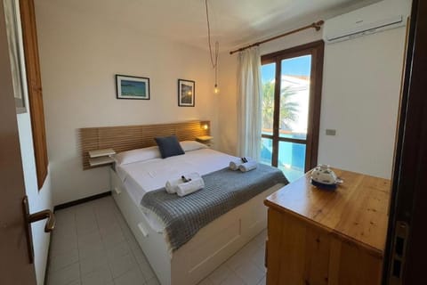 4 minuti dalla Spiaggia della Pelosa, Confortevole Appartamento con A-C Apartment in Stintino