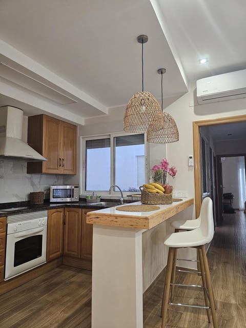 Kitchen or kitchenette, oven, stove