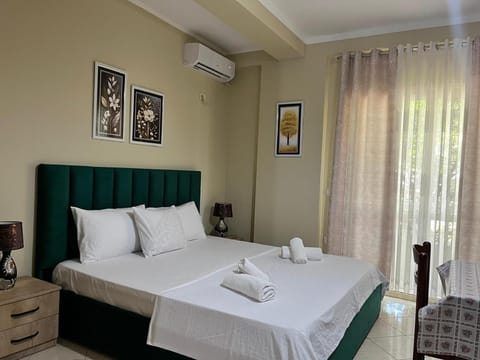 Bed, Photo of the whole room, Bedroom, towels, air conditioner