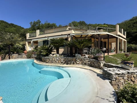 Property building, Patio, Day, Natural landscape, Garden, Garden view, Pool view, Swimming pool, sunbed