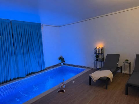 Swimming pool, sunbed