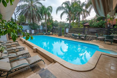 Swimming pool, sunbed