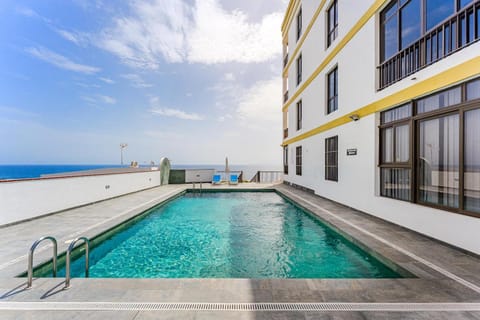 Property building, Living room, Swimming pool