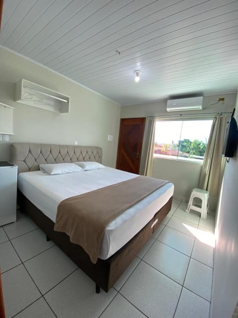 Bed, Bathroom, TV and multimedia, locker, minibar, towels, air conditioner