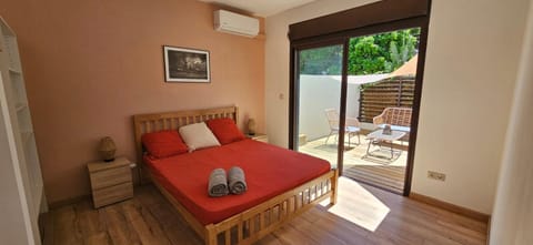 Patio, Bed, Photo of the whole room, Bedroom, towels, air conditioner
