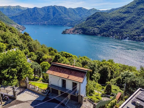 Property building, Spring, Day, Neighbourhood, Natural landscape, Bird's eye view, Lake view, Mountain view, Parking