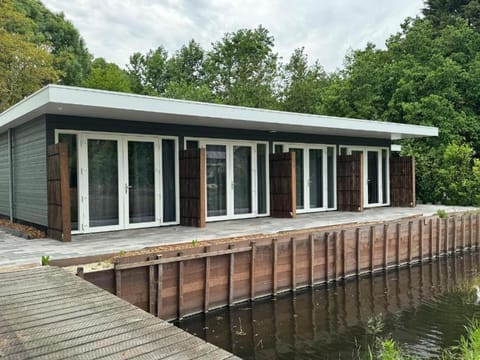 Property building, Day, Natural landscape, Lake view, River view