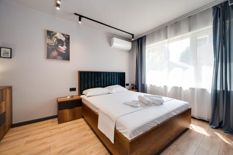 Bed, Photo of the whole room, Bedroom, towels, air conditioner
