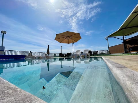 Day, Pool view, Swimming pool, sunbed