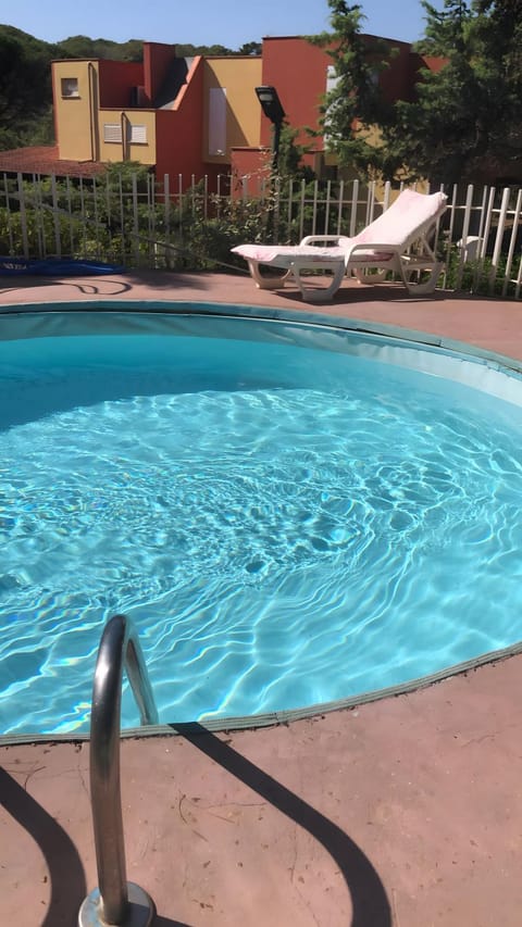 Property building, Living room, Swimming pool