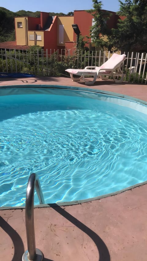 Property building, Living room, Swimming pool