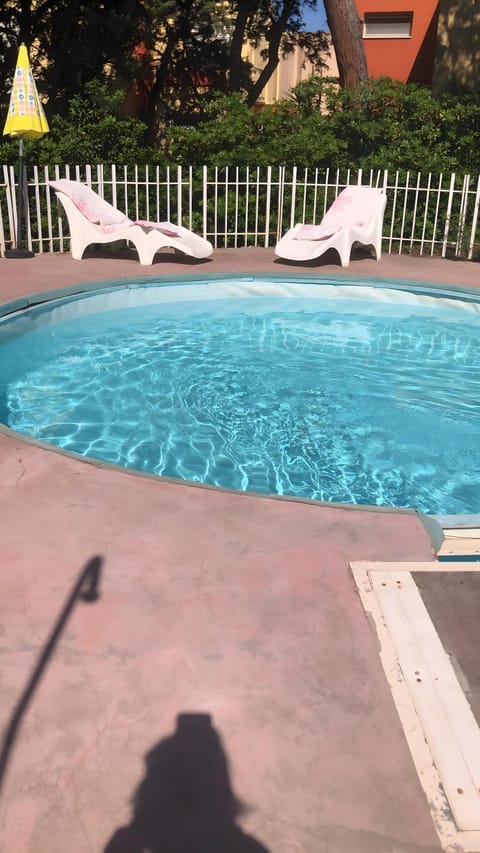 Property building, Living room, Swimming pool