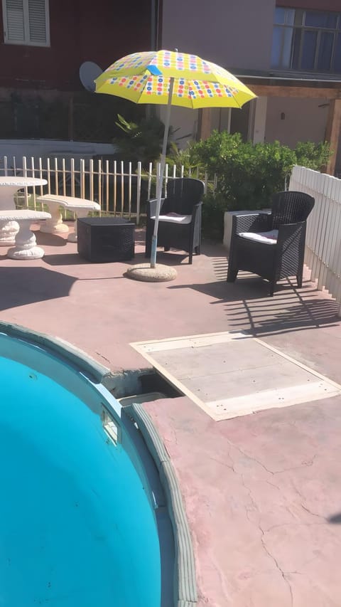 Property building, Living room, Swimming pool