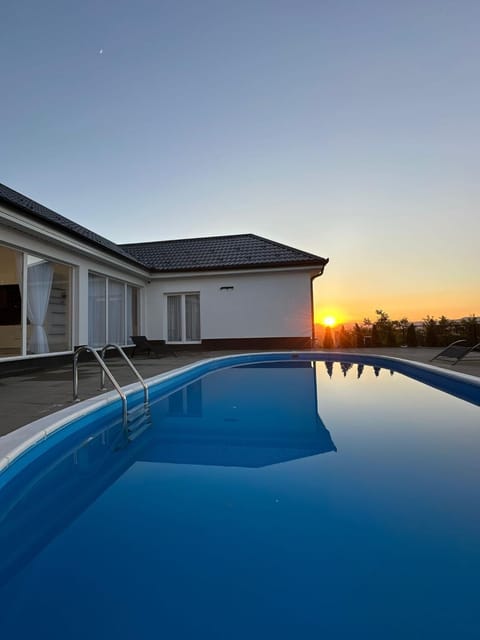 Property building, Pool view, Sunset