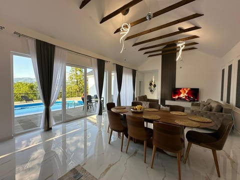 Living room, Seating area, Pool view, Swimming pool, sunbed