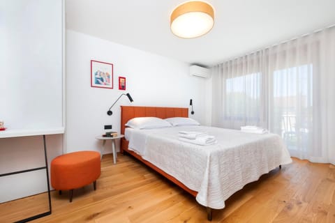 Bed, Photo of the whole room, Bedroom, towels, air conditioner