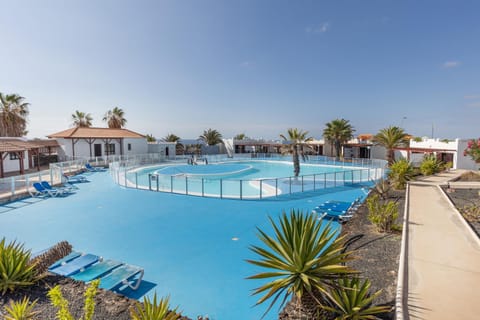 Property building, Living room, Swimming pool