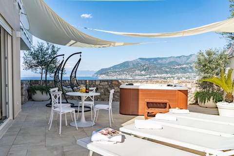 Property building, Patio, Day, Natural landscape, Hot Tub, View (from property/room), Balcony/Terrace, Dining area, Mountain view, Sea view