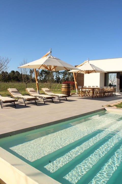 Property building, Balcony/Terrace, Dining area, Pool view