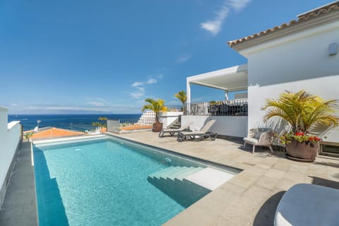 Property building, Living room, Swimming pool