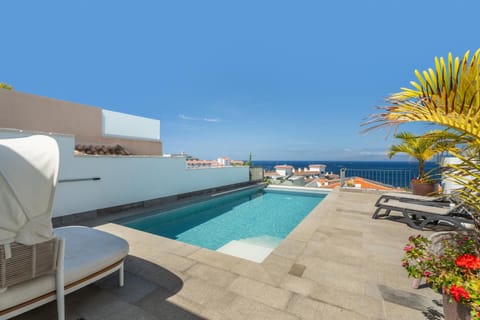Property building, Living room, Swimming pool