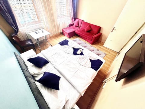 Bed, Living room, Photo of the whole room, Seating area, Bedroom, towels, air conditioner