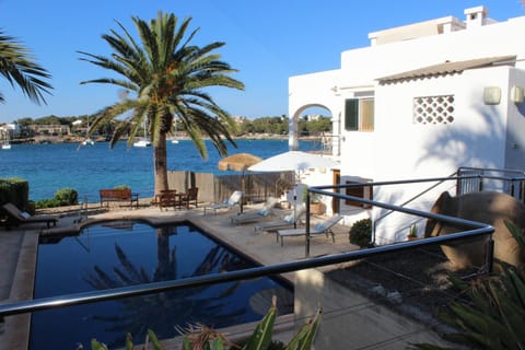 Property building, Living room, Swimming pool