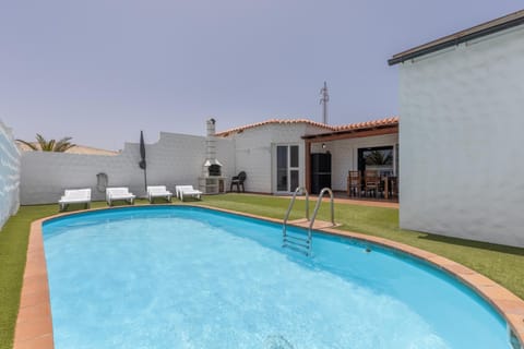 Property building, Living room, Swimming pool