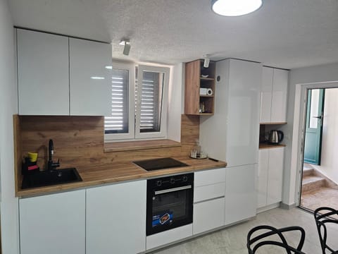 Betina apartments with parking space near the beach Apartment in Murter